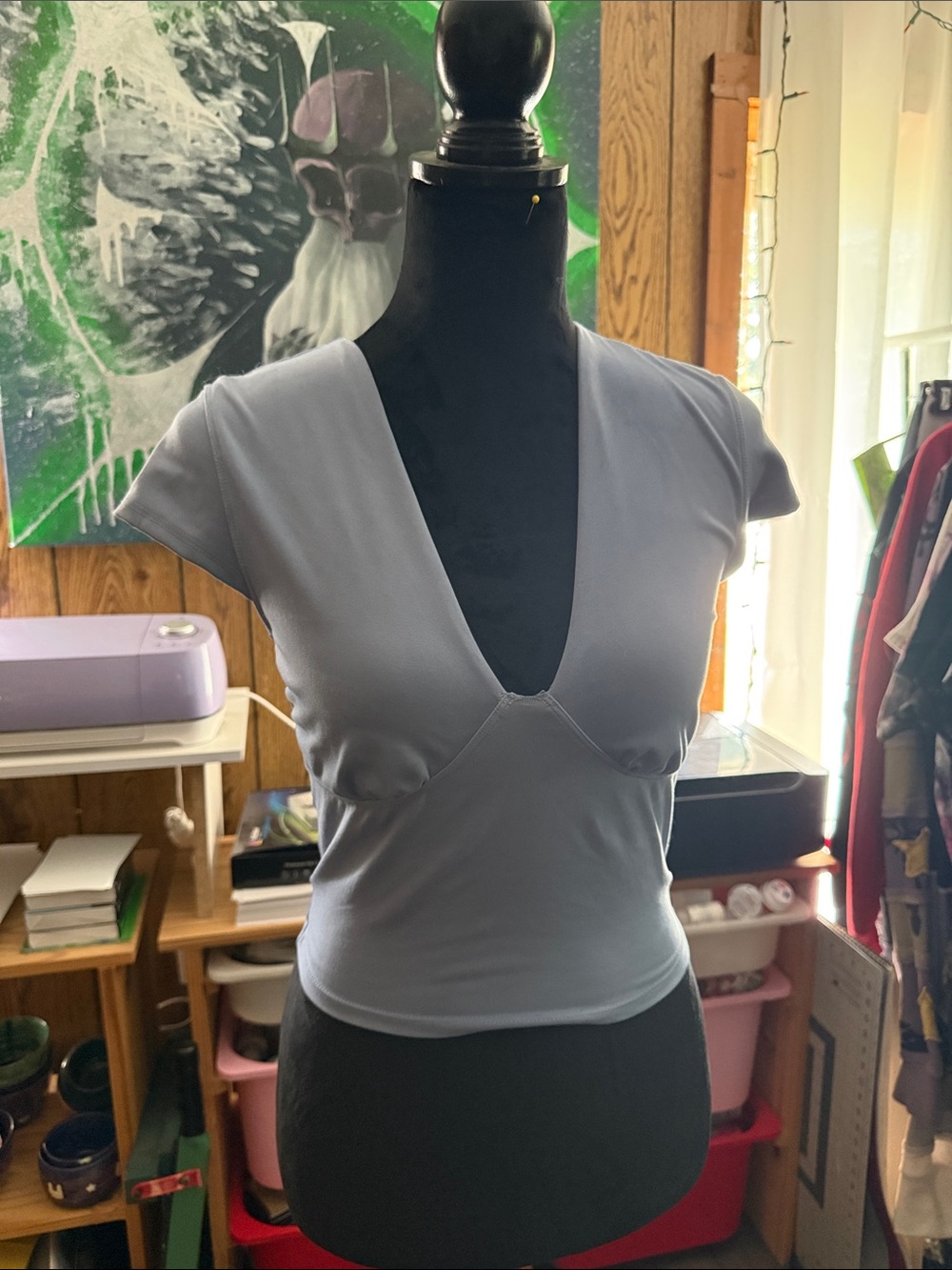 light blue athletic, fitted top